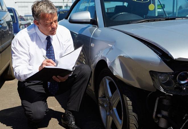 car insurance agent providing quote to client